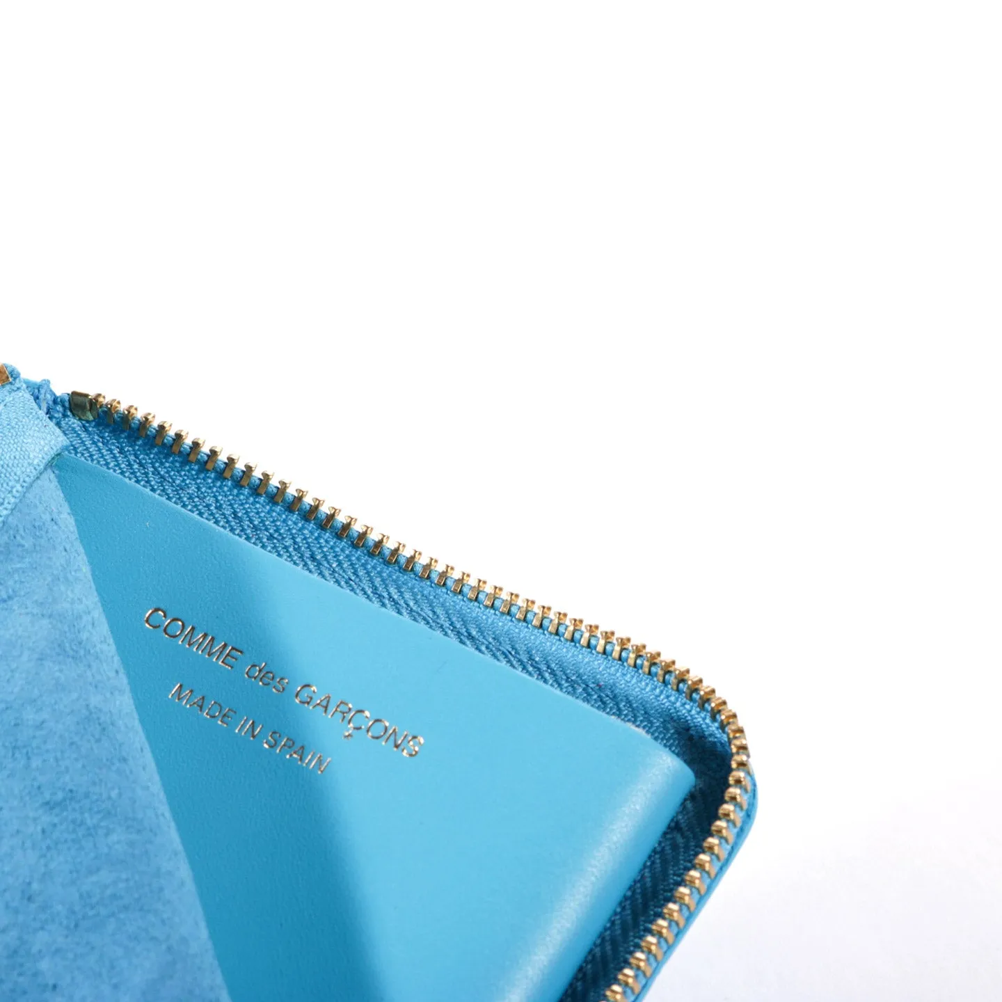 COMME DES GARCONS SA310E EMBOSSED LEATHER ZIP WALLET BLUE